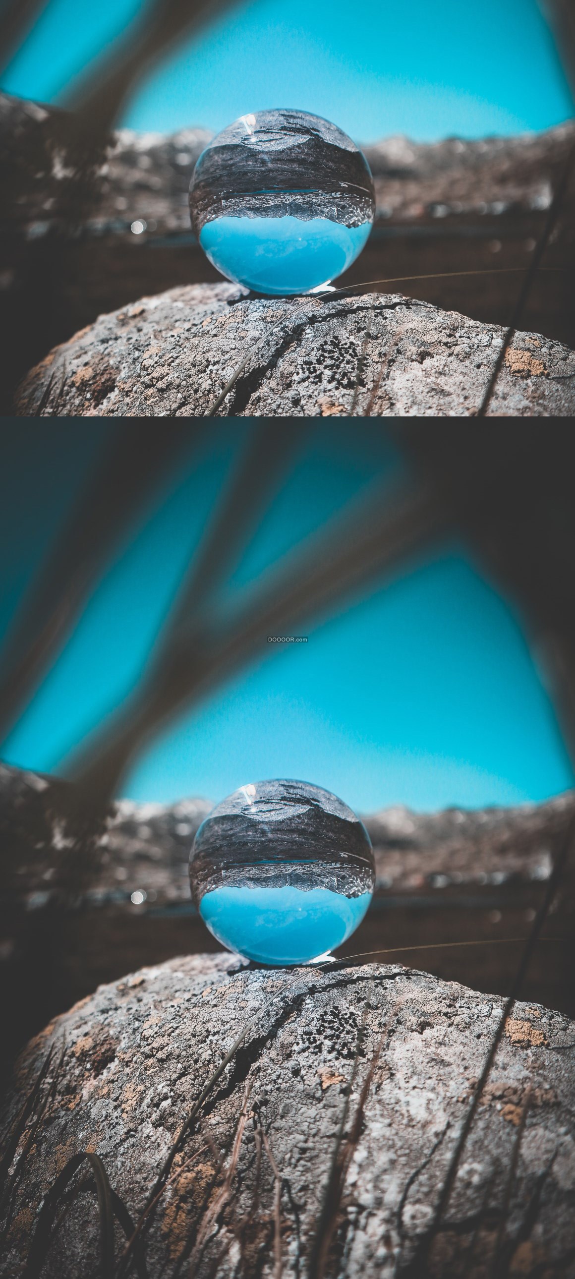 04774_透过放在褐色的地面上球状水晶球可以看到远处风景的倒立的景象科学技术才学设计.jpg