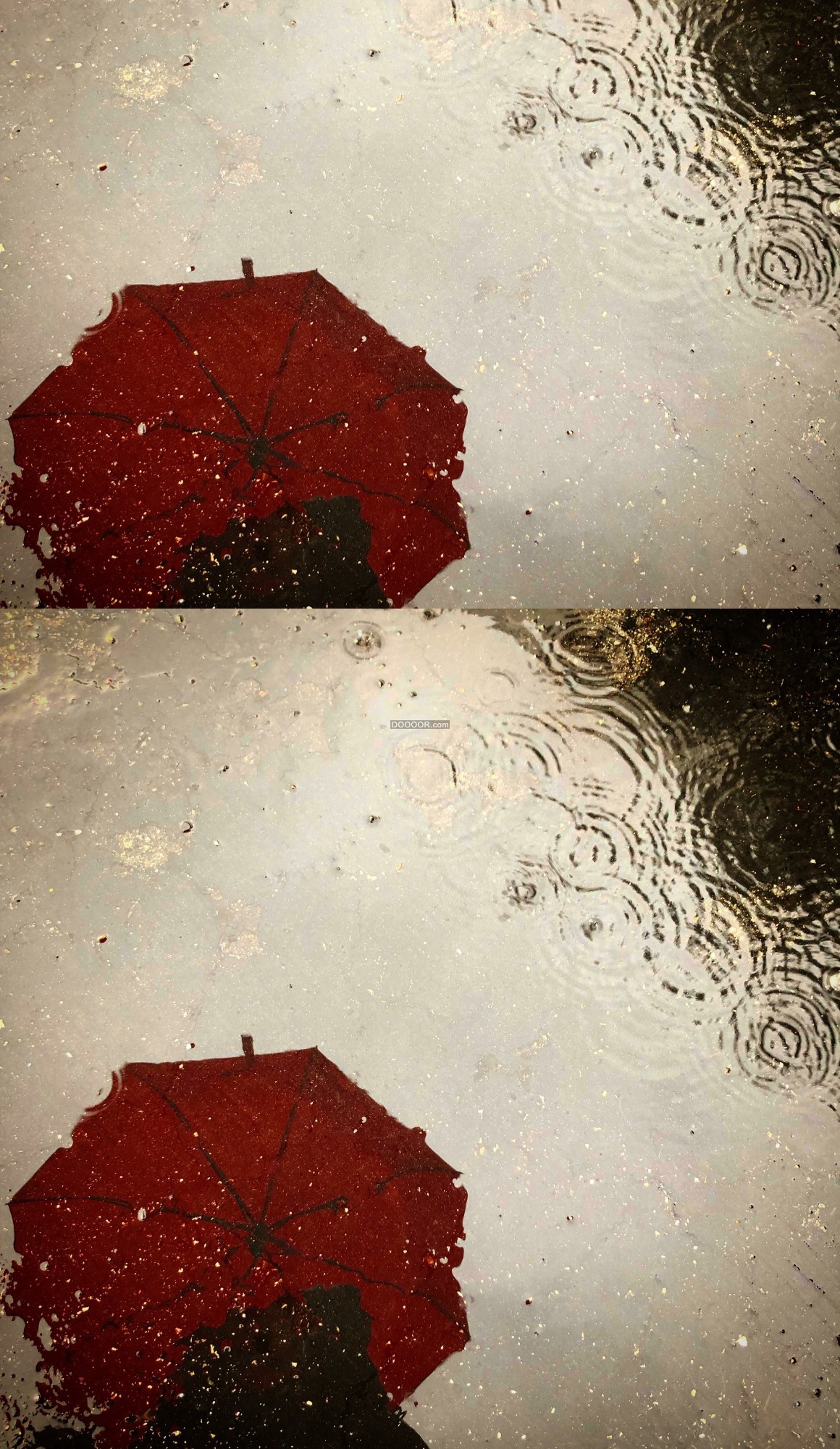 07411_雨天撑着雨伞走在浸湿的马路上倒影与涟漪.jpg