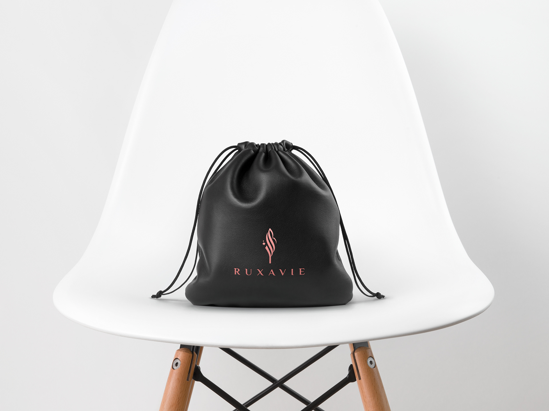 RUXAVIE Logo Branding on Behance-1.jpg